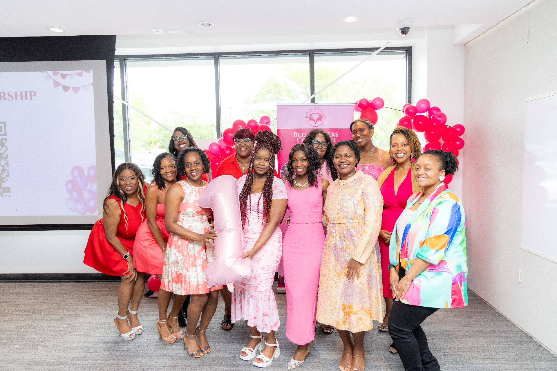 Belle Sisters Collective members celebrating together